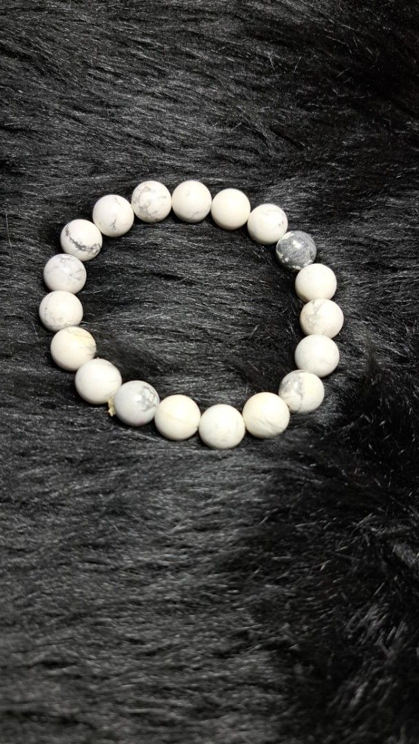 Natural White Howlite Beaded Stretch Bracelet (Category: Bracelets) located in Quezon City. Submitted by crystallinehaven (Listing ID 1468503750, Image 1). Description: HOWLITE BRACELET 12MM - Material: Genuine white howlite gemstone with natural dark grey veining - Finish: Smooth and polished round beads - Fit: Standard adult size with durable clear stretch cord for easy slip-on wear - Comfort: Lightweight and comfortable for daily use.