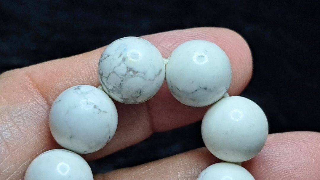 Natural White Howlite Beaded Stretch Bracelet (Category: Bracelets) located in Quezon City. Submitted by crystallinehaven (Listing ID 1468503750, Image 3). Description: HOWLITE BRACELET 12MM - Material: Genuine white howlite gemstone with natural dark grey veining - Finish: Smooth and polished round beads - Fit: Standard adult size with durable clear stretch cord for easy slip-on wear - Comfort: Lightweight and comfortable for daily use.