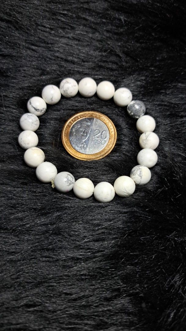Natural White Howlite Beaded Stretch Bracelet (Category: Bracelets) located in Quezon City. Submitted by crystallinehaven (Listing ID 1468503750, Image 2). Description: HOWLITE BRACELET 12MM - Material: Genuine white howlite gemstone with natural dark grey veining - Finish: Smooth and polished round beads - Fit: Standard adult size with durable clear stretch cord for easy slip-on wear - Comfort: Lightweight and comfortable for daily use.