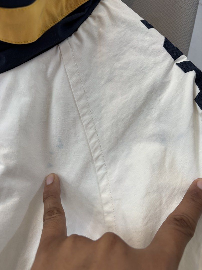 Nautica Sail Jacket (Reversible) (Category: Coats, Jackets and Outerwear) located in Echague. Submitted by jake_rc (Listing ID 1468543299, Image 2). Description: Nautica Sail Jacket Size Small on tag fits Large frame Issue: color transfer / color stain see photos Price 980 plus SF.