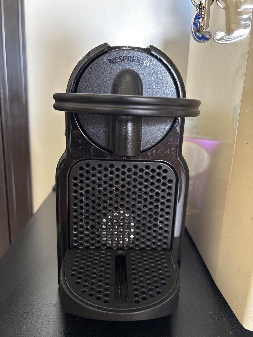 Nespresso Inissia Capsule Coffee Machine Black (Category: Coffee Machines & Makers) located in Manila. Submitted by loislane112233 (Listing ID 1468507224, Image 1). Description: - Model: Black Nespresso Inissia Coffee Machine - Brew espresso (40ml) & lungo (110ml) with just the touch of a button - Compact design, ideal for small kitchen counters - Easy-to-use top lever mechanism with standard capsule slot - Features a side water tank and removabl