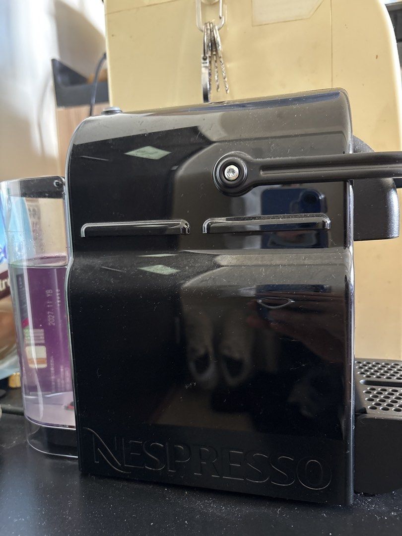Nespresso Inissia Capsule Coffee Machine Black (Category: Coffee Machines & Makers) located in Manila. Submitted by loislane112233 (Listing ID 1468507224, Image 2). Description: - Model: Black Nespresso Inissia Coffee Machine - Brew espresso (40ml) & lungo (110ml) with just the touch of a button - Compact design, ideal for small kitchen counters - Easy-to-use top lever mechanism with standard capsule slot - Features a side water tank and removabl