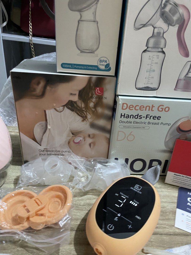 Nesting essentials (Category: Other Baby Bathing & Changing Needs) located in Malabon City. Submitted by bagsnilucas (Listing ID 1468531126, Image 3). Description: Nesting essentials and outgrown clothes Pls buy nyo na po mga mi; 2 Breast pumps, 1 wired and 1 hands free Complete all parts / no charger only Used for not more than 10x as we switched to exclusive breastfeeding BM Storage 52pcs Diaper changing spray about 90% Changing pads 8pcs Cocob