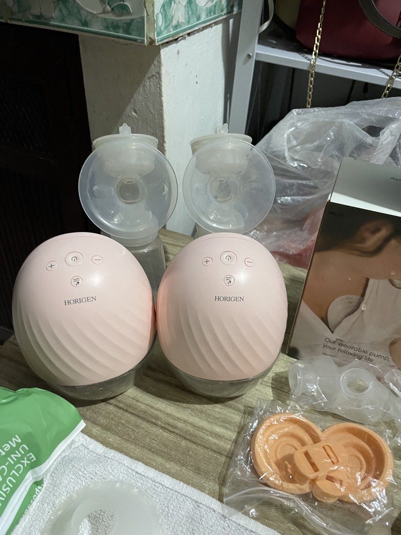 Nesting essentials (Category: Other Baby Bathing & Changing Needs) located in Malabon City. Submitted by bagsnilucas (Listing ID 1468531126, Image 2). Description: Nesting essentials and outgrown clothes Pls buy nyo na po mga mi; 2 Breast pumps, 1 wired and 1 hands free Complete all parts / no charger only Used for not more than 10x as we switched to exclusive breastfeeding BM Storage 52pcs Diaper changing spray about 90% Changing pads 8pcs Cocob