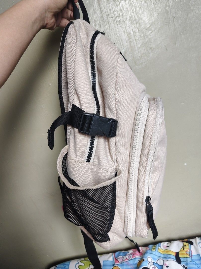 New Balance Beige Backpack with Front Pocket (Category: Backpacks) located in General Mariano Alvarez. Submitted by findsandmoreph (Listing ID 1468647724, Image 2). Description: - Authentic New Balance beige canvas backpack - Spacious main zip compartment for daily essentials - Front zippered pocket with built-in mesh organization - Dual side mesh water bottle holders - Padded mesh back panel for all-day comfort - Adjustable shoulder straps with 