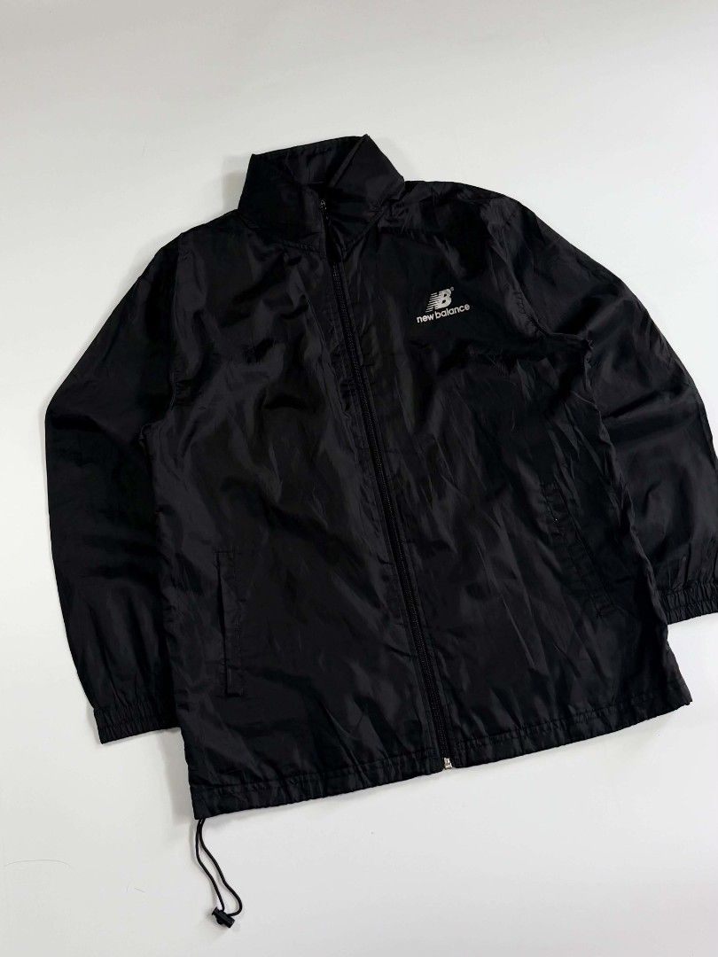 New Balance Windbreaker (Category: Coats, Jackets and Outerwear) located in Valenzuela. Submitted by veriez_gems (Listing ID 1468626829, Image 3). Description: Gear up with classic, lightweight New Balance performance—the perfect, versatile layer for your active lifestyle! Brand: New Balance Style: Men's Full-Zip Athletic Track Jacket / Windbreaker Color: Classic Solid Black Visible Details & Accuracy: Signature New Balance "NB" logo and wordmark