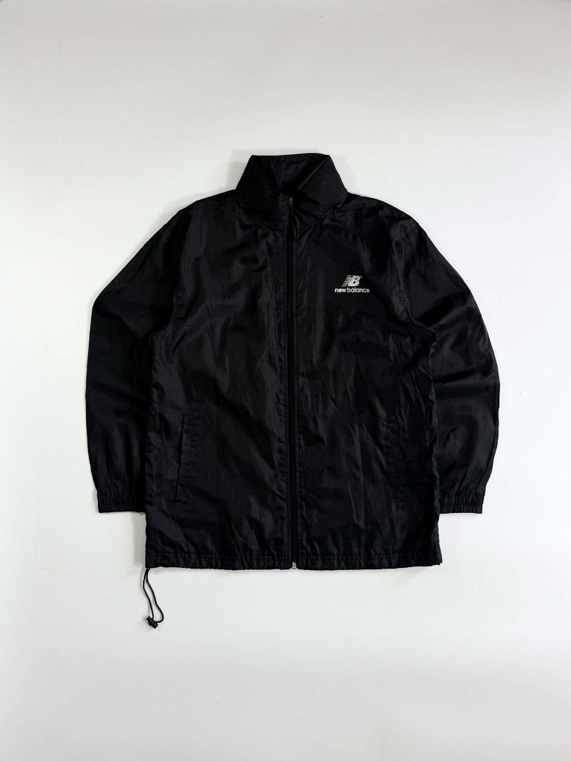 New Balance Windbreaker (Category: Coats, Jackets and Outerwear) located in Valenzuela. Submitted by veriez_gems (Listing ID 1468626829, Image 1). Description: Gear up with classic, lightweight New Balance performance—the perfect, versatile layer for your active lifestyle! Brand: New Balance Style: Men's Full-Zip Athletic Track Jacket / Windbreaker Color: Classic Solid Black Visible Details & Accuracy: Signature New Balance "NB" logo and wordmark