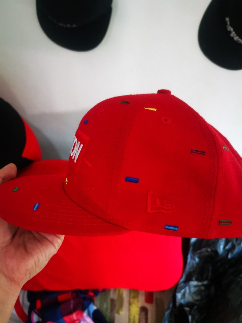New Era 9FIFTY London Red Snapback Cap (Category: Caps & Hats) located in Pasay City. Submitted by wizemindz138970 (Listing ID 1468590715, Image 3). Description: - Brand: New Era 9FIFTY - Style: Snapback cap (Size: Small to Medium) - Color/Pattern: Red with multicolored dash patterns - Design: Embroidered London box logo on the front - Material: 100% wool - Closure: Adjustable snapback with New Era branding - Condition: Brand new with clean inter