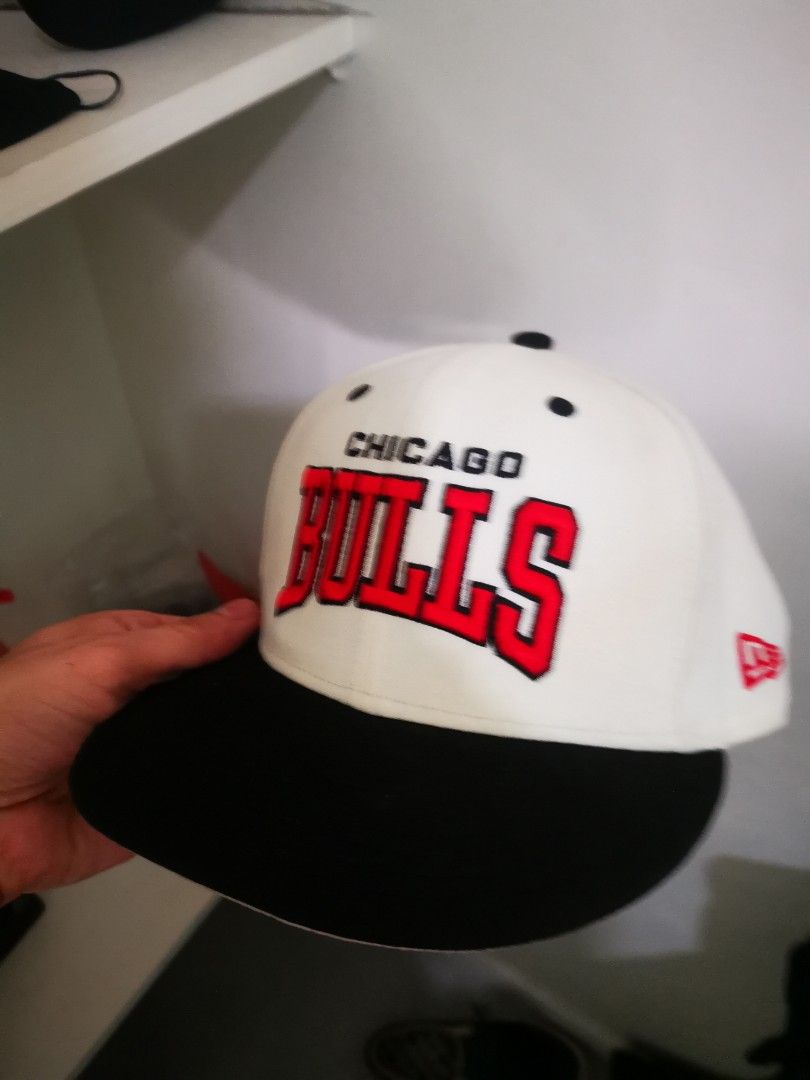 New Era Chicago Bulls 9FIFTY Snapback Hat (Category: Caps & Hats) located in Pasay City. Submitted by wizemindz138970 (Listing ID 1468591132, Image 2). Description: - Brand: New Era - Model: Chicago Bulls 9FIFTY Snapback Cap - Color: White crown with a contrasting black brim - Details: Bold embroidered Bulls logo on the front, NBA logo tag on the side - Fit: Adjustable plastic snapback closure with team logo tab - Condition: good but needs washin