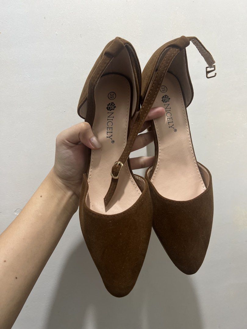 Size 8 NICELY Brown Suede Pointed Toe Block Heel Size 39 (Category: Heels) located in Manila. Submitted by 34samf (Listing ID 1468599488, Image 1). Description: - Brand: NICELY - Size: 39 - Material: Brown suede - Style: Pointed toe with ankle strap and gold-tone buckle - Heel: Stable chunky block heel - Condition: Clean soles with zero wear - Versatile neutral earth tone Location: Manila📍.