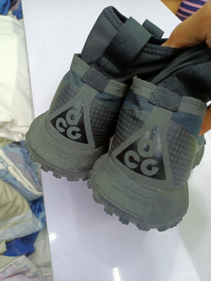 Nike ACG Mountain Fly GORE-TEX (Category: Sneakers) located in Manila. Submitted by pnjdianne25879 (Listing ID 1468604982, Image 3). Description: - Brand: Nike ACG - Model: Mountain Fly GORE-TEX - Color: Dark Green / Black - Key Features: Quick-lace toggle system, high-top sockliner, and iconic ACG branding - Sole: Chunky React foam with aggressive lug pattern for superior grip - Condition / Use: Built for rough outdoor terrain and wet weather - 