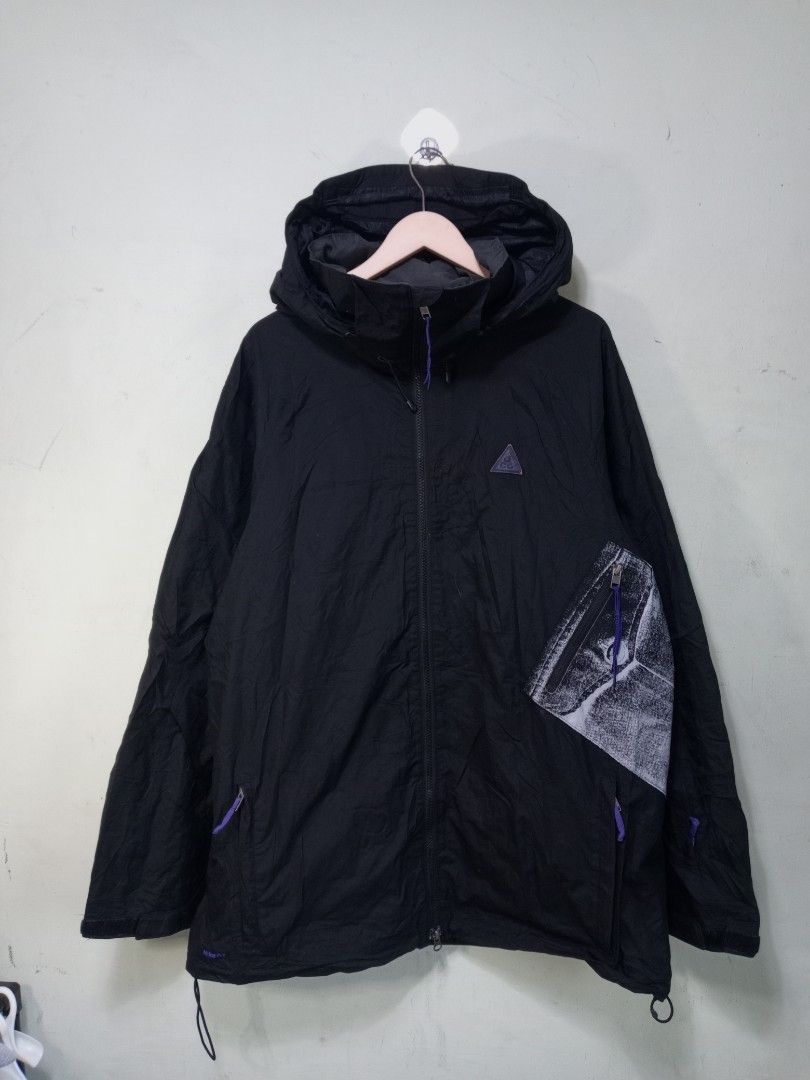 Nike ACG Storm-FIT Outer Layer Jacket Black Size L (Category: Coats, Jackets and Outerwear) located in Manila. Submitted by onewikstraight (Listing ID 1468709579, Image 1). Description: - Brand: Nike ACG - Color: Black with purple zip pulls and drawcords - Size: Large to XXL 24 to 25W 31 to 32L - Material/Tech: Storm-FIT technology for outdoor elements - Features: Full zip front with hood, contrast graphic sleeve pocket with zipper, and iconic tr