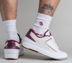 Nike Air Jordan 2 Retro Low (Category: Sneakers) located in Manila. Submitted by themb (Listing ID 1468529626, Image 1). Description: - Model: Air Jordan 2 Retro Low - Colorway: White and Dark Red - Details: Suede side paneling, perforated leather toe box, embroidered wings logo on tongue - Condition: Good, with minor dirt marks on midsoles from previous wear - Inclusions: Comes with original box - Perfect for daily wear or collection.