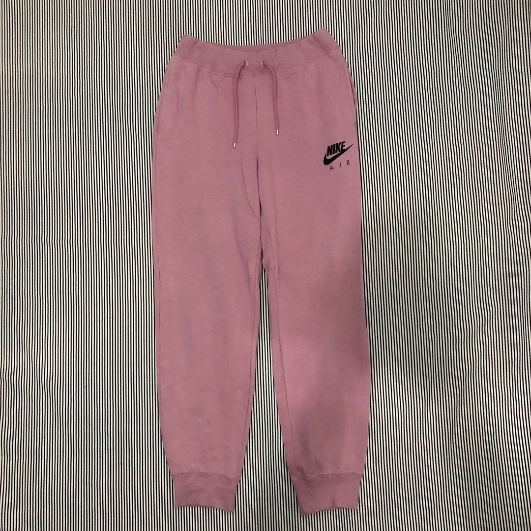 Nike Air Pink Sweatpants (Category: Joggers) located in Angeles City. Submitted by gray_thrift8 (Listing ID 1468557273, Image 1). Description: Dimensions: 27-32 width 39.5 length 12 thigh 5 hem Issue: Last pic Need wash Pm!.