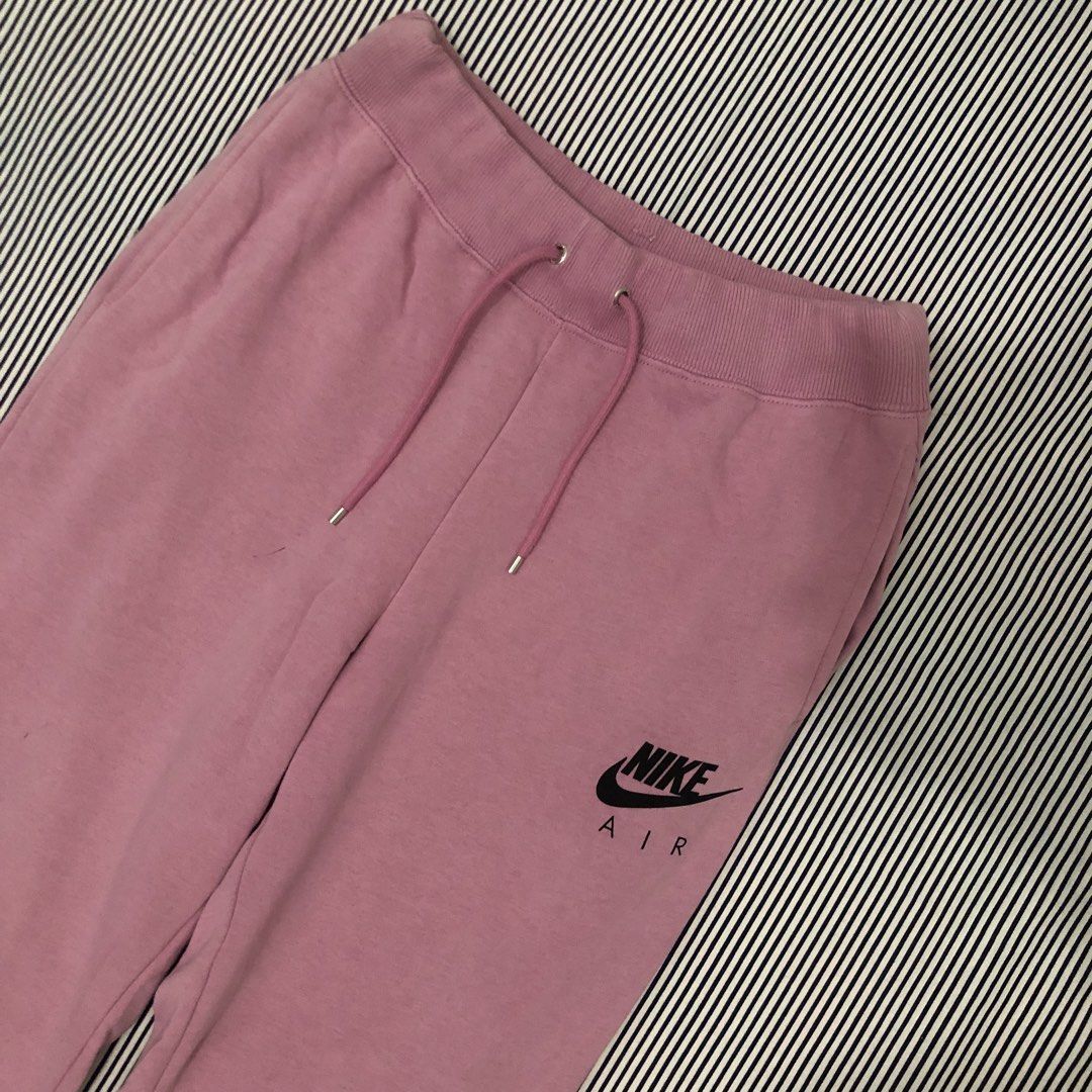 Nike Air Pink Sweatpants (Category: Joggers) located in Angeles City. Submitted by gray_thrift8 (Listing ID 1468557273, Image 2). Description: Dimensions: 27-32 width 39.5 length 12 thigh 5 hem Issue: Last pic Need wash Pm!.