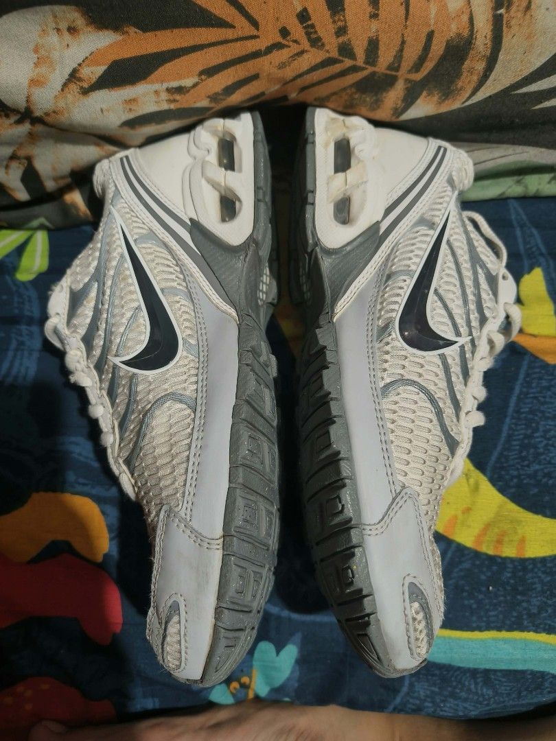 Nike Air Torch 4 White Grey Size US 8 (Category: Sneakers) located in Manila. Submitted by kiyanna.preloved (Listing ID 1468570832, Image 2). Description: - Brand: Nike - Model: Air Torch 4 (Style Code: 343846-100) - Colorway: White and Grey - Size: US 8 / UK 7 / EUR 41 / CM 26 - Upper: Breathable mesh with synthetic overlays - Cushioning: Air Max unit in the heel - Outsole: Durable rubber with waffle traction pattern - Condition: Clean uppers an