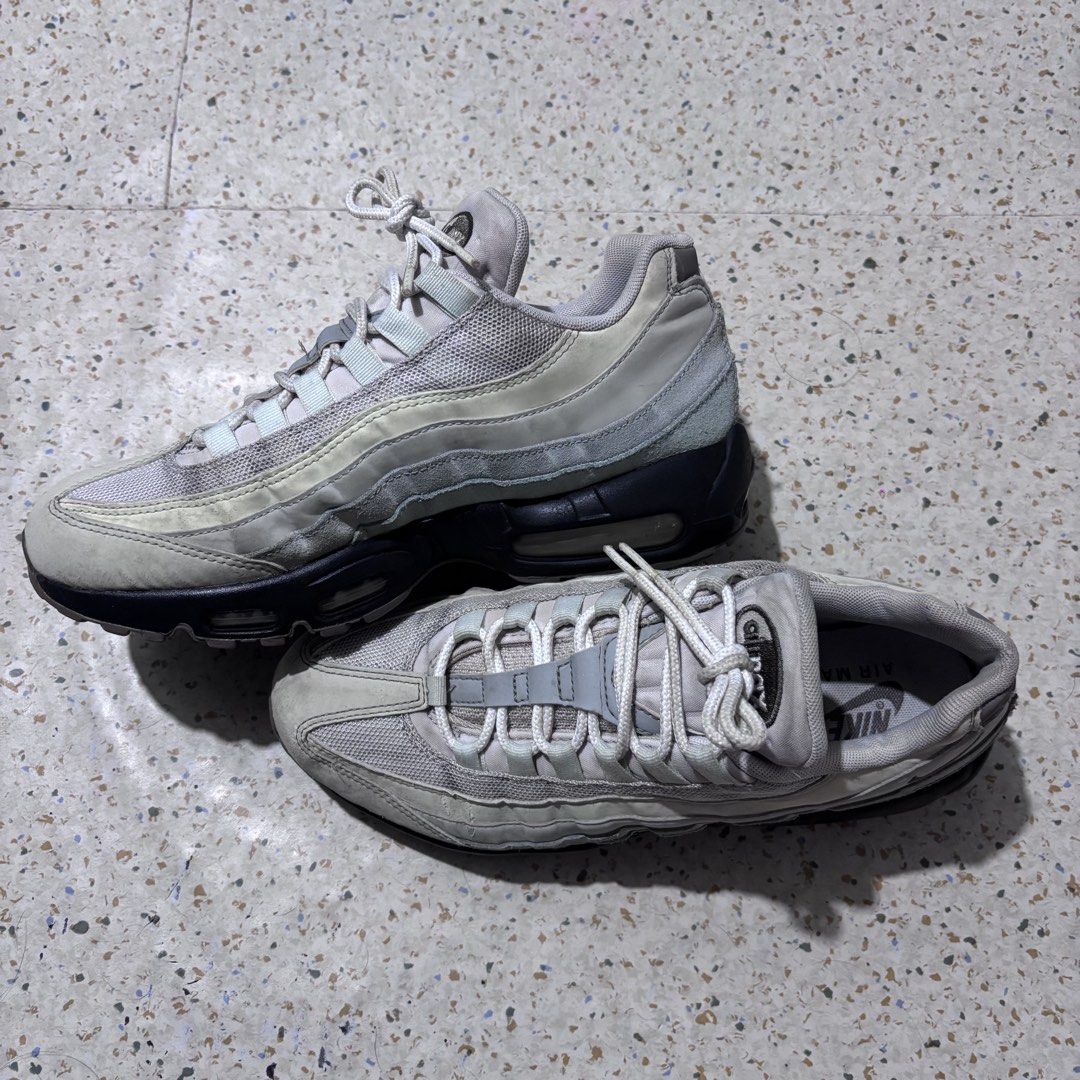 Nike Airmax 95 Sequoia Japan Exclusive (Category: Sneakers) located in Baguio. Submitted by rhayburn (Listing ID 1468616959, Image 2). Description: - Brand: Nike - Model: Air Max 95 - Colorway: Grey and Black - Design: Classic gradient side panels with mesh and suede overlays - Cushioning: Chunky sole with visible Air units - Condition: Pre-owned with minor dust marks and wear on midsoles and toe areas - Perfect for daily casual wear and rotation