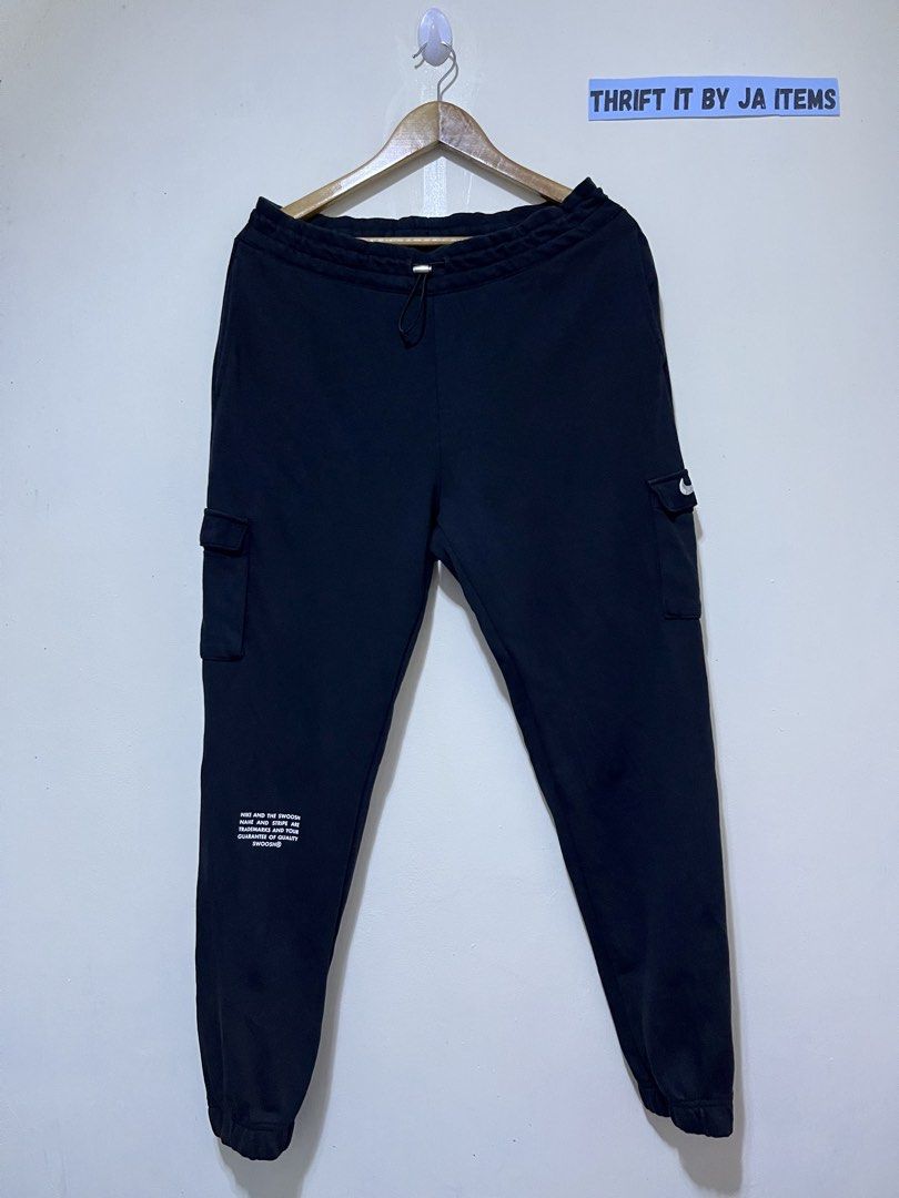 Nike Black Cargo Joggers Sweatpants (Category: Joggers) located in Baguio. Submitted by jaitems22 (Listing ID 1468711124, Image 3). Description: 🔥NIKE SWOOSH CARGO JOGGER 🔴Size :XL ON TAG 🔴Dimension:W32-36 L38 🔴Issue: NO ISSUE 🔴Condition:VERYGOOD TO EXCELLENT 🔴Color rate :9.3/10 💰MINE: 430+SF.