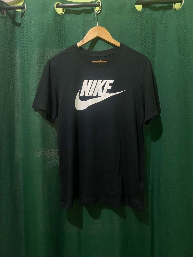 Nike Black Graphic T-Shirt Size L (Category: Tshirts & Polo Shirts ) located in Quezon City. Submitted by elihur.tuazon (Listing ID 1468617062, Image 2). Description: - Brand: Nike - Color: Black with big white chest logo - Size: Large (Style Code: AR5005-010) - Material: Comfortable cotton - Condition: Clean, well-maintained - Style: Classic crew neck, highly versatile and easy to style.