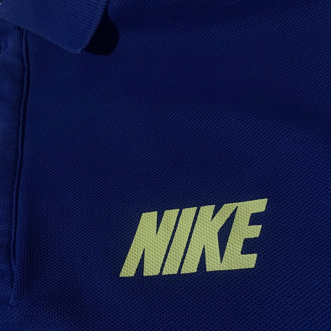 Nike blue polo (Category: Activewear) located in Manila. Submitted by kidd21vergil (Listing ID 1468630467, Image 3). Description: Nike polo blue Good condition W22 L27 9/10 color rate Issue. Minimal Fold line pinholes.