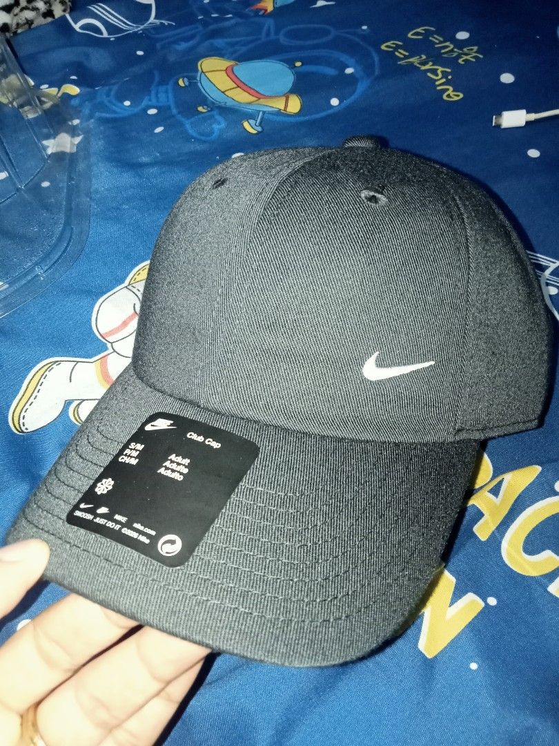 Nike Club Cap Black (Category: Caps & Hats) located in Manila. Submitted by ryanjoseph94468 (Listing ID 1468590685, Image 1). Description: - Brand new with tags (BNWT) - Color: Classic Black with embroidered white Nike Swoosh - Size: S/M - Adjustable strapback closure with metal buckle - Includes original paper insert inside crown to maintain shape - 100% authentic and ready to ship.