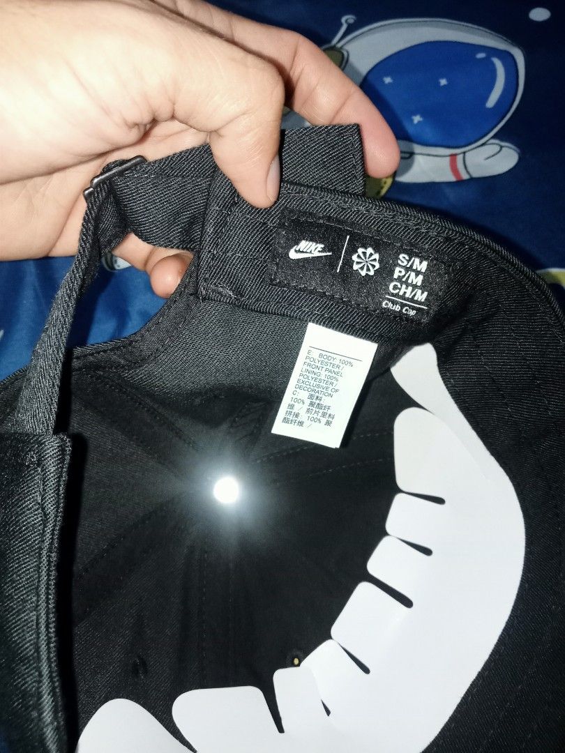 Nike Club Cap Black (Category: Caps & Hats) located in Manila. Submitted by ryanjoseph94468 (Listing ID 1468590685, Image 3). Description: - Brand new with tags (BNWT) - Color: Classic Black with embroidered white Nike Swoosh - Size: S/M - Adjustable strapback closure with metal buckle - Includes original paper insert inside crown to maintain shape - 100% authentic and ready to ship.