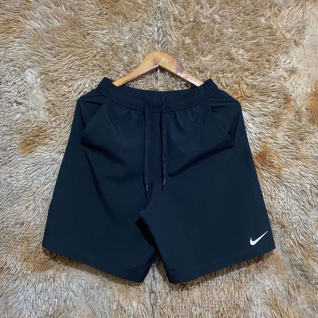 Nike Dri-FIT Black Athletic Shorts Size S (Category: Shorts) located in Butuan. Submitted by jc13thrifts (Listing ID 1468708686, Image 1). Description: - Brand: Nike - Style: Dri-FIT Athletic Shorts - Color: Black - Size: Small - Origin: Made in Vietnam - Features: Elastic waistband with drawstring, side pockets, and white Nike swoosh logo - Material: Lightweight performance fabric - Condition: Excellent, clean all around - Ideal for: Training, w