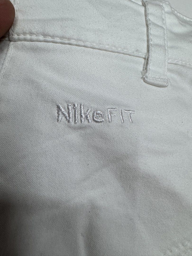 Nike Fit White Cargo Shorts Size 6 (Category: Shorts) located in Bustos. Submitted by thenlnclot60500 (Listing ID 1468527860, Image 3). Description: - Brand: Nike - Style: Fit cargo shorts - Color: White - Size: 6 / 34 on tag - Features: Multiple utility pockets, button closure, zipper fly - Details: Embroidered logo on the back, small swoosh on front leg - Condition: Clean fabric - Perfect for: Casual wear or outdoor activities.
