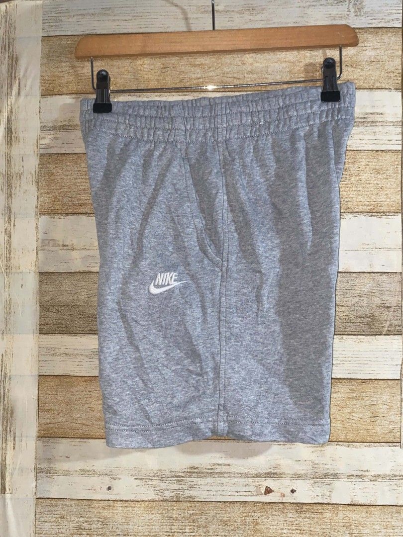Nike Gray Sweatshorts (Category: Shorts) located in Maasin. Submitted by trippythirftyyy (Listing ID 1468643410, Image 1). Description: - Brand: Nike - Item: Sweatshorts - Color: Gray - Size: Large (youth) small (adult) - Style Code: FD3015-063 - Origin: Made in Jordan - Material: Soft cotton blend - Features: Embroidered Nike logo on left leg, comfortable elastic waistband with adjustable drawstring - Condition: Great for lounging or casual wear