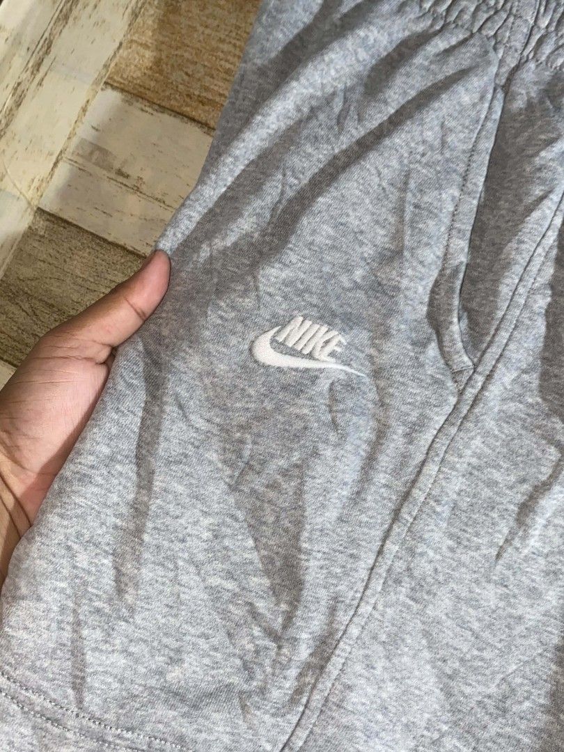 Nike Gray Sweatshorts (Category: Shorts) located in Maasin. Submitted by trippythirftyyy (Listing ID 1468643410, Image 2). Description: - Brand: Nike - Item: Sweatshorts - Color: Gray - Size: Large (youth) small (adult) - Style Code: FD3015-063 - Origin: Made in Jordan - Material: Soft cotton blend - Features: Embroidered Nike logo on left leg, comfortable elastic waistband with adjustable drawstring - Condition: Great for lounging or casual wear