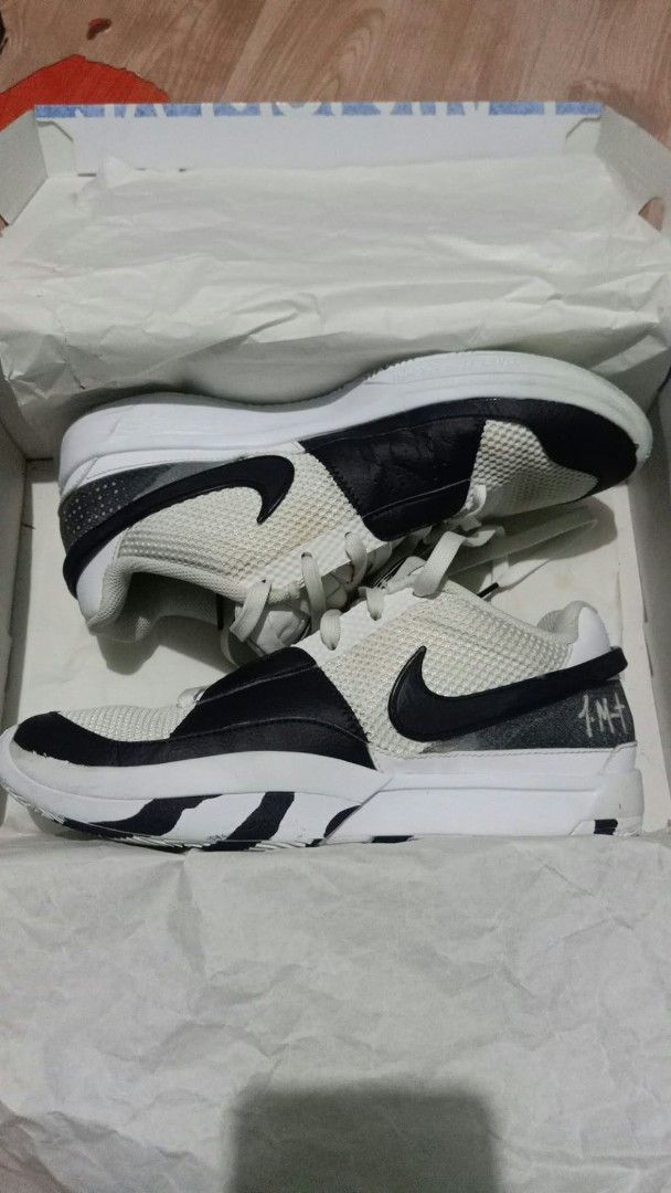 Nike Ja 1 EP White Black Men Size 9.5 (Category: Sneakers) located in Manila. Submitted by livecloud_db381d (Listing ID 1468690408, Image 3). Description: - Model: Nike Ja 1 EP - Colorway: White and Black - Size: Men's US 9.5 / EUR 43 / UK 8.5 - Details: Signature Ja Morant branding and number 12 on the heels - Performance: Superior traction pattern on durable rubber outsoles - Inclusion: Comes with the original shoe box - Condition: Brand new / 