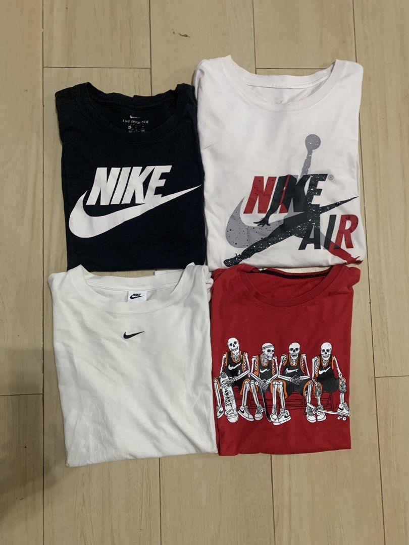 Nike Jordan Graphic T-Shirts Bundle 4 Pieces (Category: Tshirts & Polo Shirts ) located in Manila. Submitted by thrifty111 (Listing ID 1468620869, Image 2). Description: - Set of 4 authentic Nike and Jordan t-shirts for daily rotation - Includes: Black Nike swoosh tee, white Jordan Air graphic tee, white minimalist swoosh tee, and red skeleton basketball tee - Style: Standard crew neck, short sleeve, casual streetwear and athletic fit - Condition