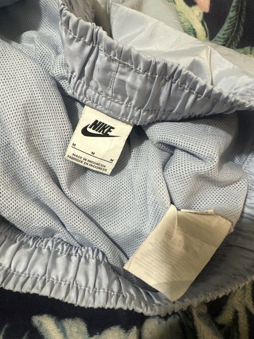 Nike Light Blue Nylon Drawstring Shorts (Category: Shorts) located in Cauayan City . Submitted by onins28 (Listing ID 1468525635, Image 2). Description: - Color: Light blue - Material: Lightweight nylon - Waistband: Elastic with a thick white adjustable drawstring - Features: Convenient side pockets and embroidered white Nike swoosh logo - Condition: Great piece for casual wear, workouts, or lounging - Mode of Payment: GCash, BPI, or COD availabl