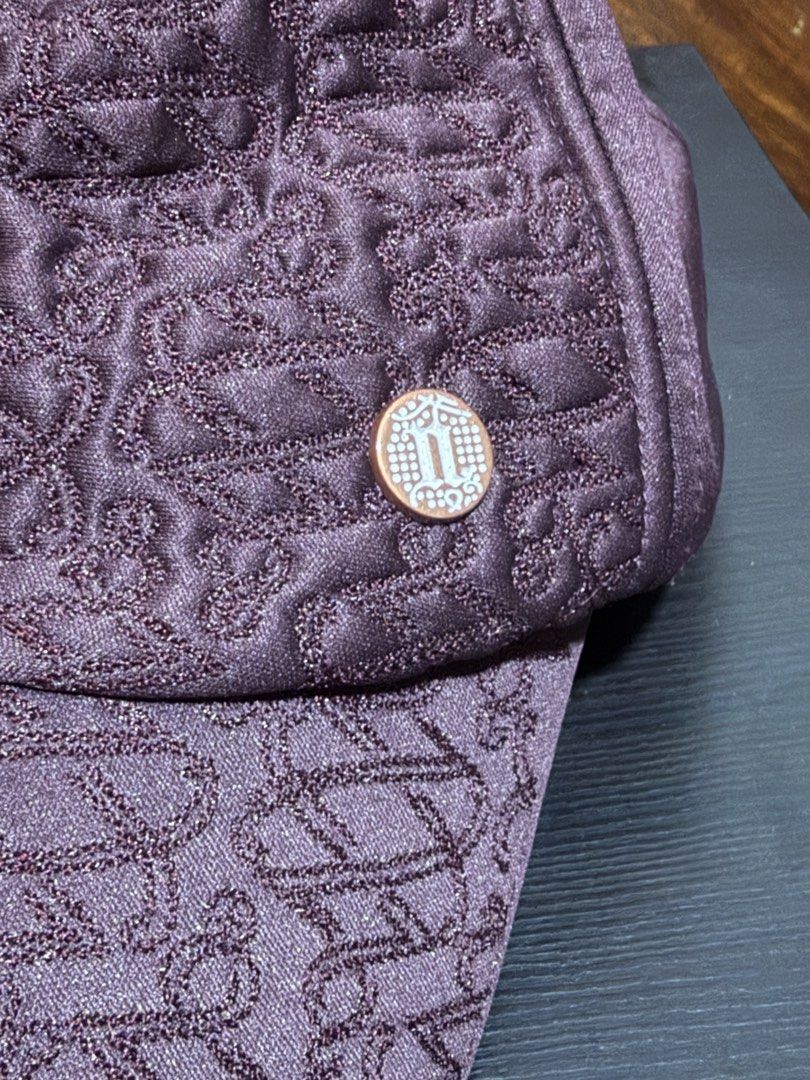 Nike Maroon Quilted Pattern Cap (Category: Hats & Beanies) located in Manila. Submitted by db_collective (Listing ID 1468504805, Image 2). Description: - Brand: Nike - Color: Maroon - Style: Snapback cap with quilted texture - Details: Metal Nike logo button on the side and branded interior lining - Size: One size fits all (adjustable snapback closure).