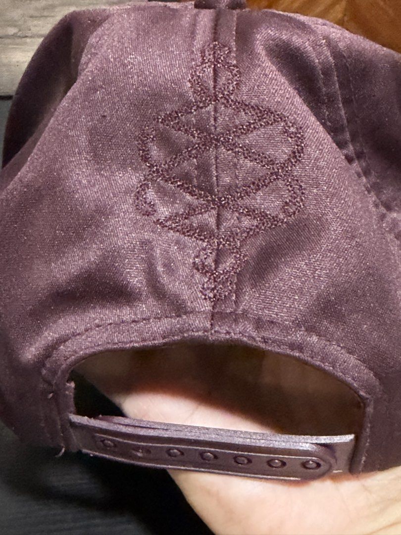 Nike Maroon Quilted Pattern Cap (Category: Hats & Beanies) located in Manila. Submitted by db_collective (Listing ID 1468504805, Image 3). Description: - Brand: Nike - Color: Maroon - Style: Snapback cap with quilted texture - Details: Metal Nike logo button on the side and branded interior lining - Size: One size fits all (adjustable snapback closure).