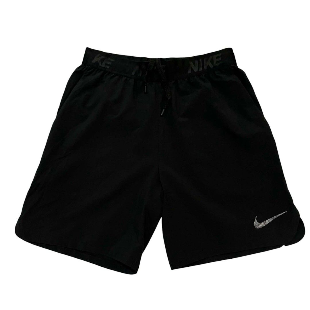 Nike Men's Black Athletic Shorts with Drawstring (Category: Shorts) located in Cagayan de Oro. Submitted by lootfindzzzz (Listing ID 1468620919, Image 1). Description: - Brand: Nike - Color: Classic Black - Condition: Clean, no tears or stains - Waistband: Bold Nike branding all around with inner adjustable drawstring - Logo: Reflective silver swoosh on lower left leg - Pockets: Deep side pockets included - Material: Lightweight and comfortable -