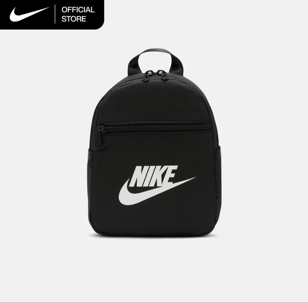 Nike Mini Backpack Black White (Category: Backpacks) located in Marikina City. Submitted by ellies.mnl (Listing ID 1468522526, Image 2). Description: - Color: Classic black with a striking white Nike swoosh logo - Compact & Lightweight: Perfect for everyday use and carrying essentials - Storage: Main compartment with a convenient internal mesh pocket and a front zipper pocket - Comfort & Portability: Features adjustable black shoulder straps and 