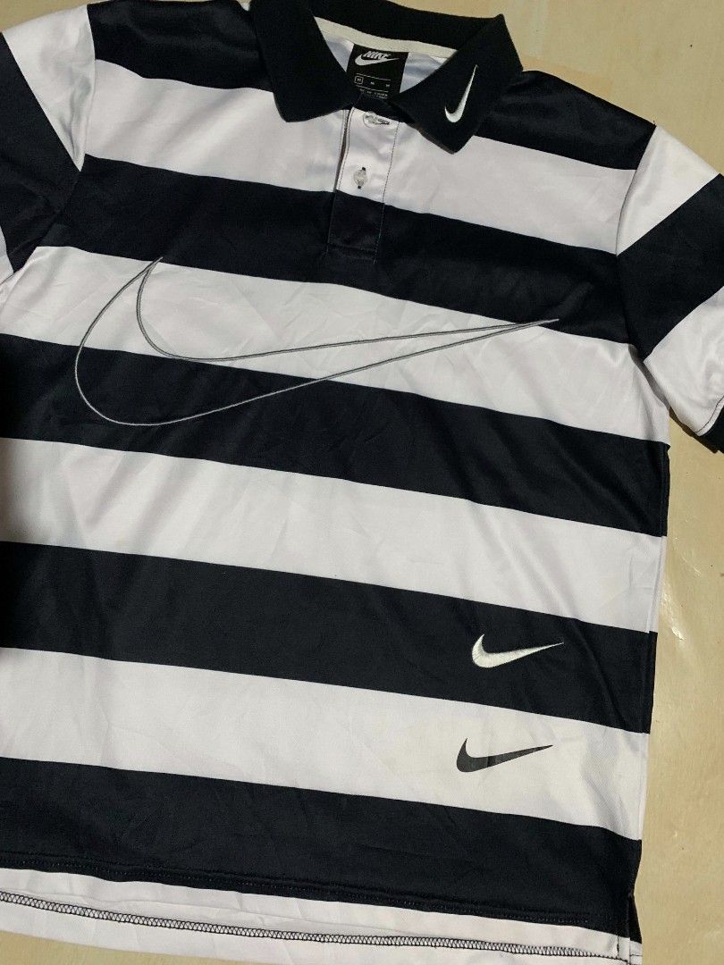 NIKE MULTIPLE SWOOSH (Category: Tshirts & Polo Shirts ) located in Polangui. Submitted by laurgarments (Listing ID 1468507412, Image 3). Description: NIKE MULTIPLE SWOOSH DIMES: W-21 L-26-27 CONDITION AND COLOR RATE:9.3/10 ISSUE:NONE/NEED WASH.
