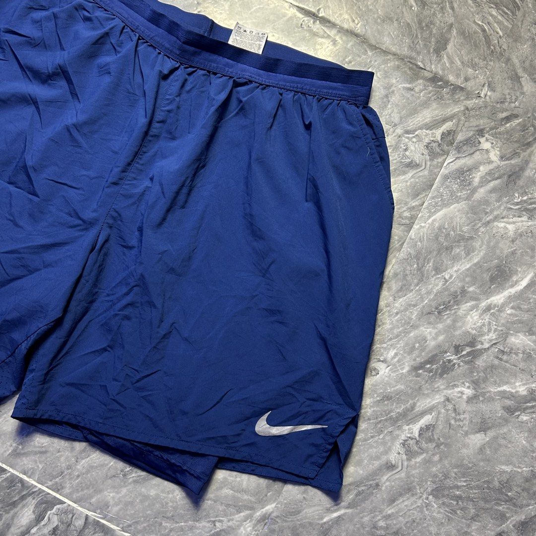 NIKE NAVY BLU RUNNING SHORT (Category: Activewear) located in Dasmarinas. Submitted by 2slickdeals_ (Listing ID 1468546035, Image 3). Description: SIZE XL 32 - 36 WAIST 17 LENGTH EXCELLENT CONDITION ISSUE: MINOR RUN. COLOR RATE: 9.5 / 10.