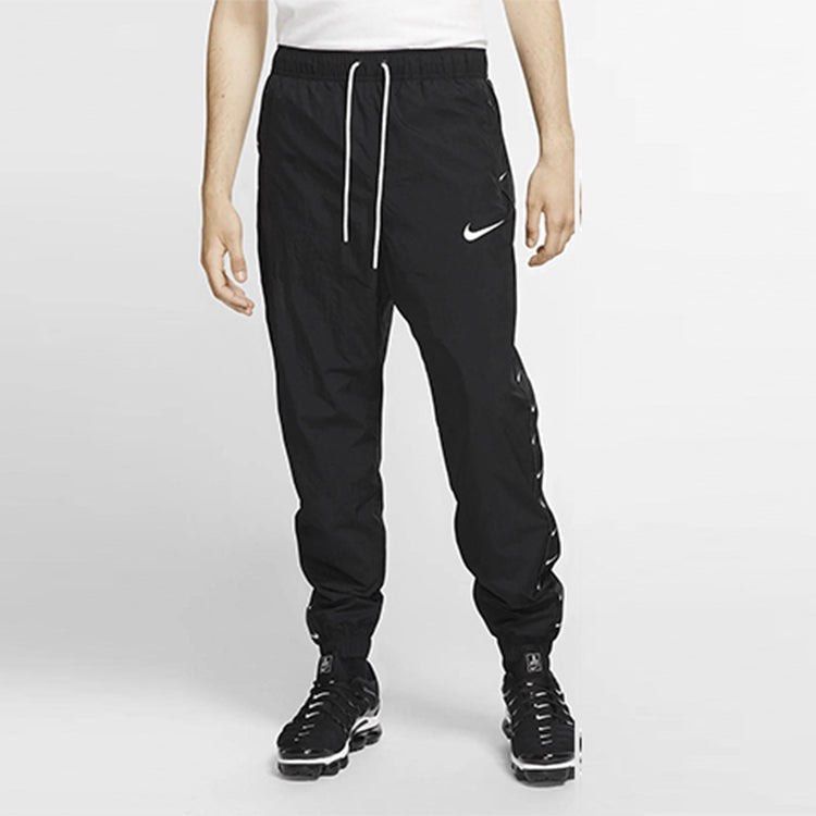 Nike Repeat Swoosh Black Nylon Track Pants (Category: Joggers) located in Baguio. Submitted by jaitems22 (Listing ID 1468711022, Image 1). Description: 🔥NIKE WOVEN SIDE TAPE JOGGER 🔴Size :MEDUIM ON TAG 🔴Dimension:W29-36 L40 🔴Issue: CHECK LAST PIC 🔴Condition:VERYGOOD TO EXCELLENT 🔴Color rate :9.5/10 💰MINE: 680+SF.