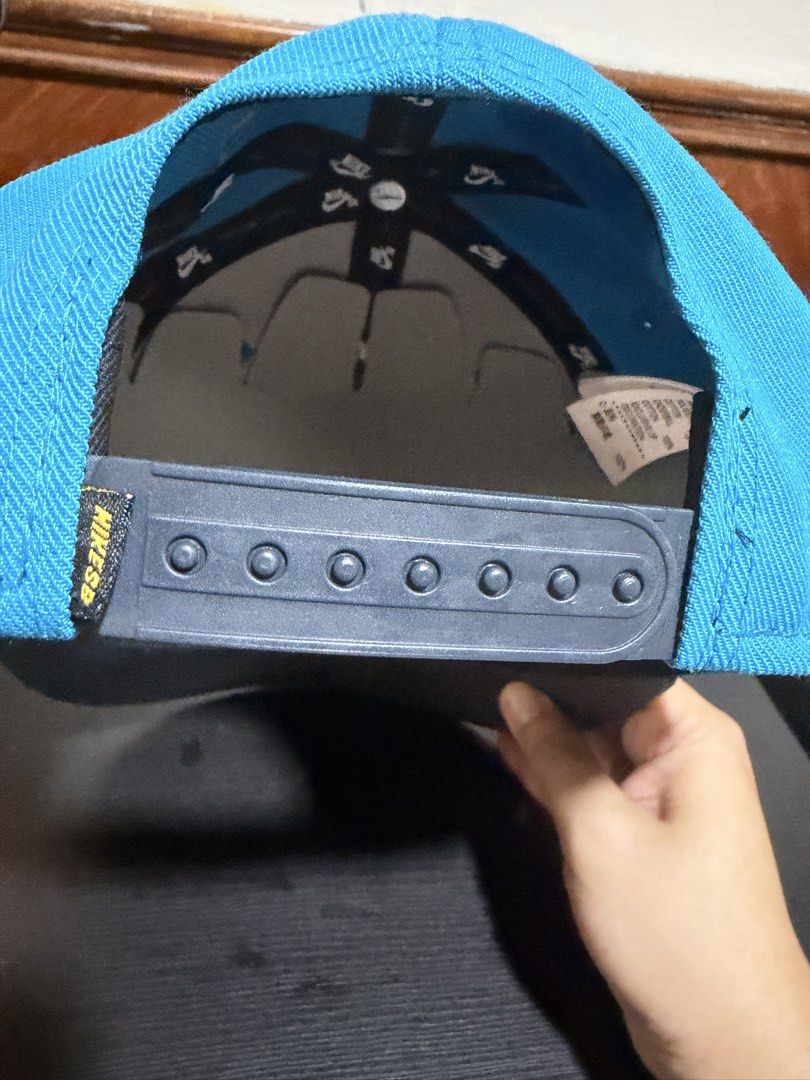 Nike SB Snapback Cap (Category: Caps & Hats) located in Manila. Submitted by db_collective (Listing ID 1468505047, Image 2). Description: - Authentic Nike SB snapback cap - Colorway: Light blue front panels with grey brim and back strap - Design: Yellow embroidered Nike SB logo on the front - Fit: Adjustable plastic snap closure with mini Nike SB tag - Details: Inner taping with repeated Nike SB branding - Condition: Excellent, unused.