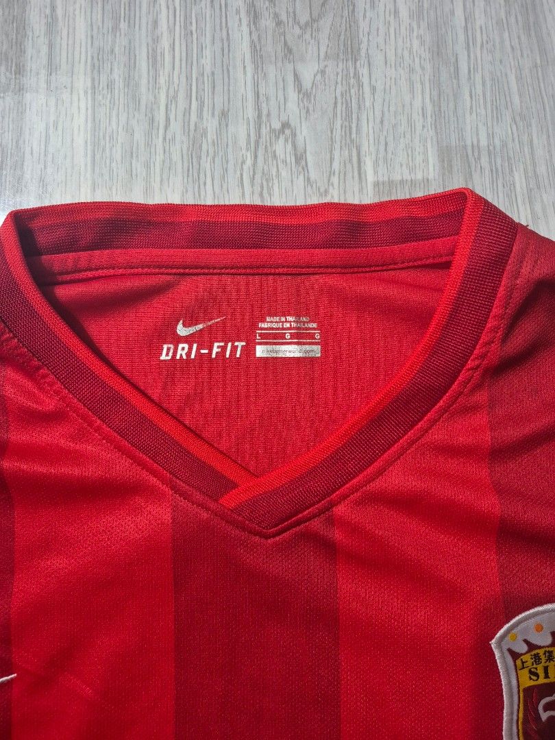 Nike Soccer Jersey (Category: Tshirts & Polo Shirts ) located in Taguig. Submitted by kai.exe (Listing ID 1468582961, Image 2). Description: Nike Shanghai Soccer jersey Drifit Crimson Red colorway Size Large 23x28 excellent condition no issues open for nego.