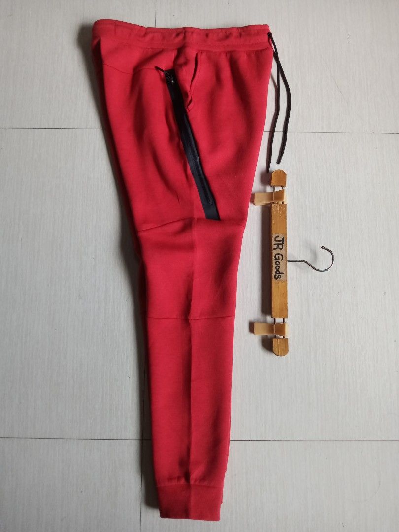Nike Tech Fleece Jogger Team Red Black (Category: Joggers) located in Tanay. Submitted by jrgoods (Listing ID 1468520770, Image 3). Description: Nlke tech fleece Medium Waistline 30-32 Length 38 Good as new condition 1499+ship Tanay Rizal location Shipping Nationwide - Color: Team Red with black accents - Signature bonded zip pocket on the right leg - Elastic drawstring waistband for an adjustable fit - Ribbed ankle cuffs for a classic tapered lo