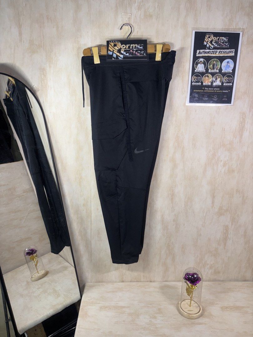 NIKE TECH PACK CARGO PANTS (Category: Trousers) located in Cabuyao City. Submitted by pormanation-thrift-store (Listing ID 1468600045, Image 3). Description: NIKE TECH PACK CARGO PANTS Condition: LIKE NEW Color rate: 10/10 (PWEDE SA MASELAN) Size: 30 Dimes: 32”Wx37”L Issue: NONE‼️ Price: 1800.