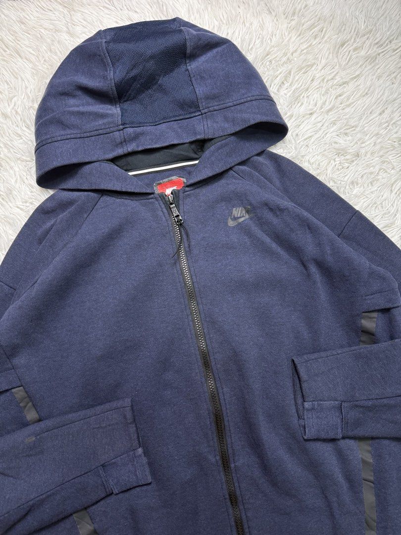 Nike techfleece (Category: Hoodies) located in Baguio. Submitted by sellingtonshop (Listing ID 1468522999, Image 2). Description: t10. Nike techfleece jacket (blue) Size: L Dimes: 31*24 Condition: very good color rate: 9/10 Mine: 780 Steal: 880 Grab: 980.