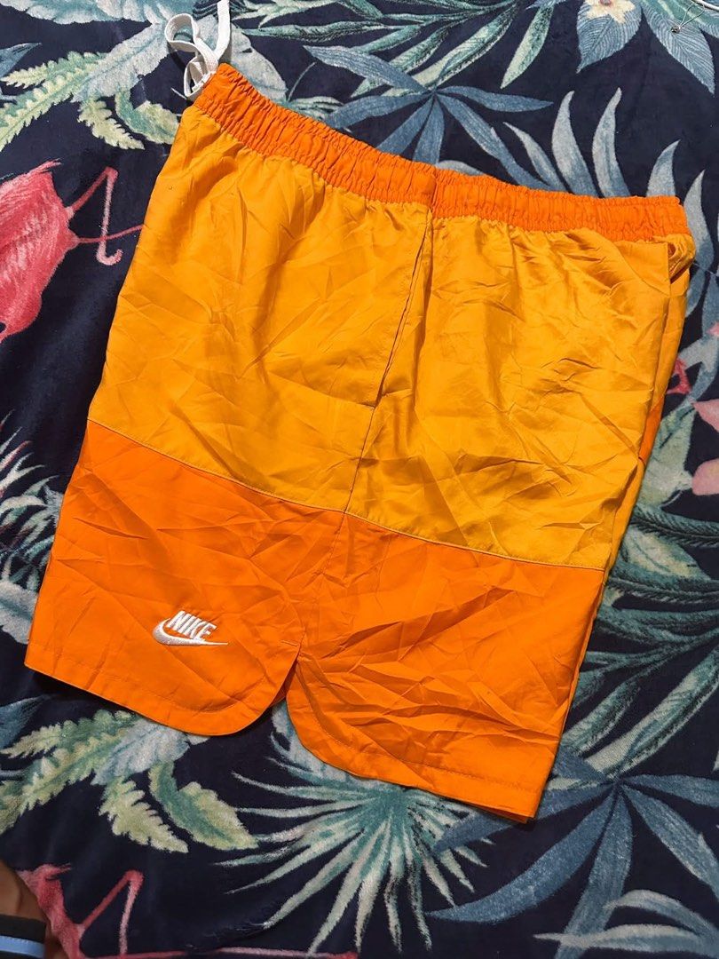 Nike Two-Tone Orange Athletic Shorts (Category: Shorts) located in Manila. Submitted by irenekaren57943 (Listing ID 1468530050, Image 1). Description: Nike two tone Excellent condition Size 32-36 Lenght 19 .