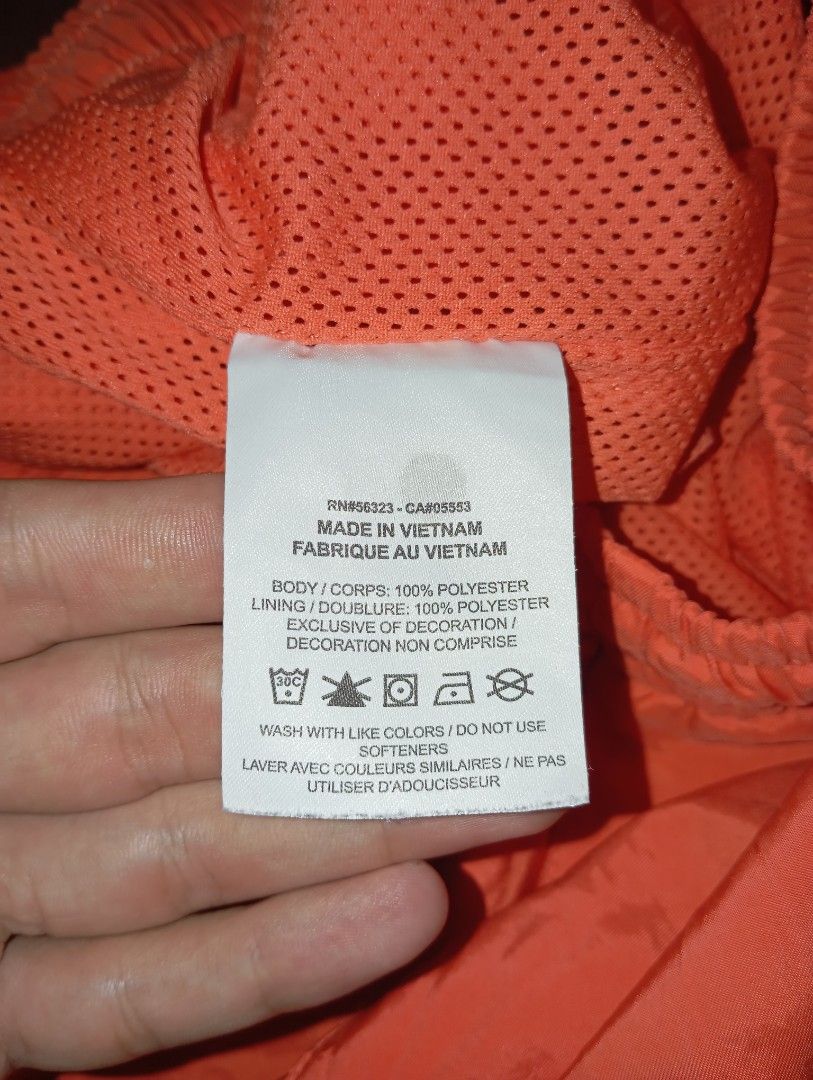 Nike Woven Orange Shorts Size XL (Category: Shorts) located in Guihulngan. Submitted by jaylordfra13193 (Listing ID 1468683040, Image 3). Description: - Brand: Nike - Color: Bright Orange - Size: XL - Style/Model: AR2382-842 - Material: 100% polyester with breathable mesh interior - Features: Adjustable drawstring waistband and small white Nike logo on left leg - Origin: Made in Vietnam - Condition: Excellent Free Size Length 19 leg Opening 13.5.
