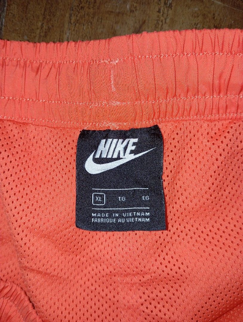 Nike Woven Orange Shorts Size XL (Category: Shorts) located in Guihulngan. Submitted by jaylordfra13193 (Listing ID 1468683040, Image 2). Description: - Brand: Nike - Color: Bright Orange - Size: XL - Style/Model: AR2382-842 - Material: 100% polyester with breathable mesh interior - Features: Adjustable drawstring waistband and small white Nike logo on left leg - Origin: Made in Vietnam - Condition: Excellent Free Size Length 19 leg Opening 13.5.