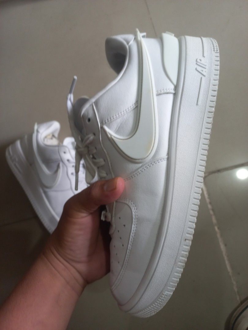 Nike x Ambush Air Force 1 Low White (Category: Sneakers) located in Kalibo. Submitted by jofit2ndhandshoes (Listing ID 1468676591, Image 2). Description: - Model: Nike Air Force 1 Low x Ambush - Colorway: Clean White - Size: 11 US - Condition: Excellent, minimal creasing on clean upper - Key Features: Distinctive chunky elongated swoosh, Ambush branding on heels, and classic AF1 metal dubraes - Comfort: Solid rubber cupsole equipped with signatur