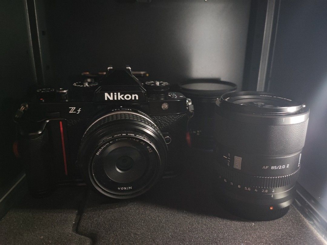 Nikon Zf Mirrorless Camera with Lenses (Category: Cameras) located in Cebu City. Submitted by besteverto56831 (Listing ID 1468642388, Image 1). Description: - Model: Nikon Zf Full-Frame Body (Black finish) - Lens 1: Nikon Z 28mm f/2.8 SE (mounted) - Lens 2: Viltrox AF 85/2.0 EVO lens with Grip - Condition: Mint, safely stored in a dark cabinet - Perfect ready-to-shoot bundle for enthusiasts and pros With boxes except for nikon 28mm.